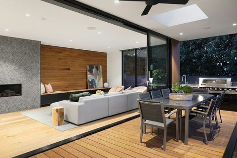 Open plan living with timber ceiling